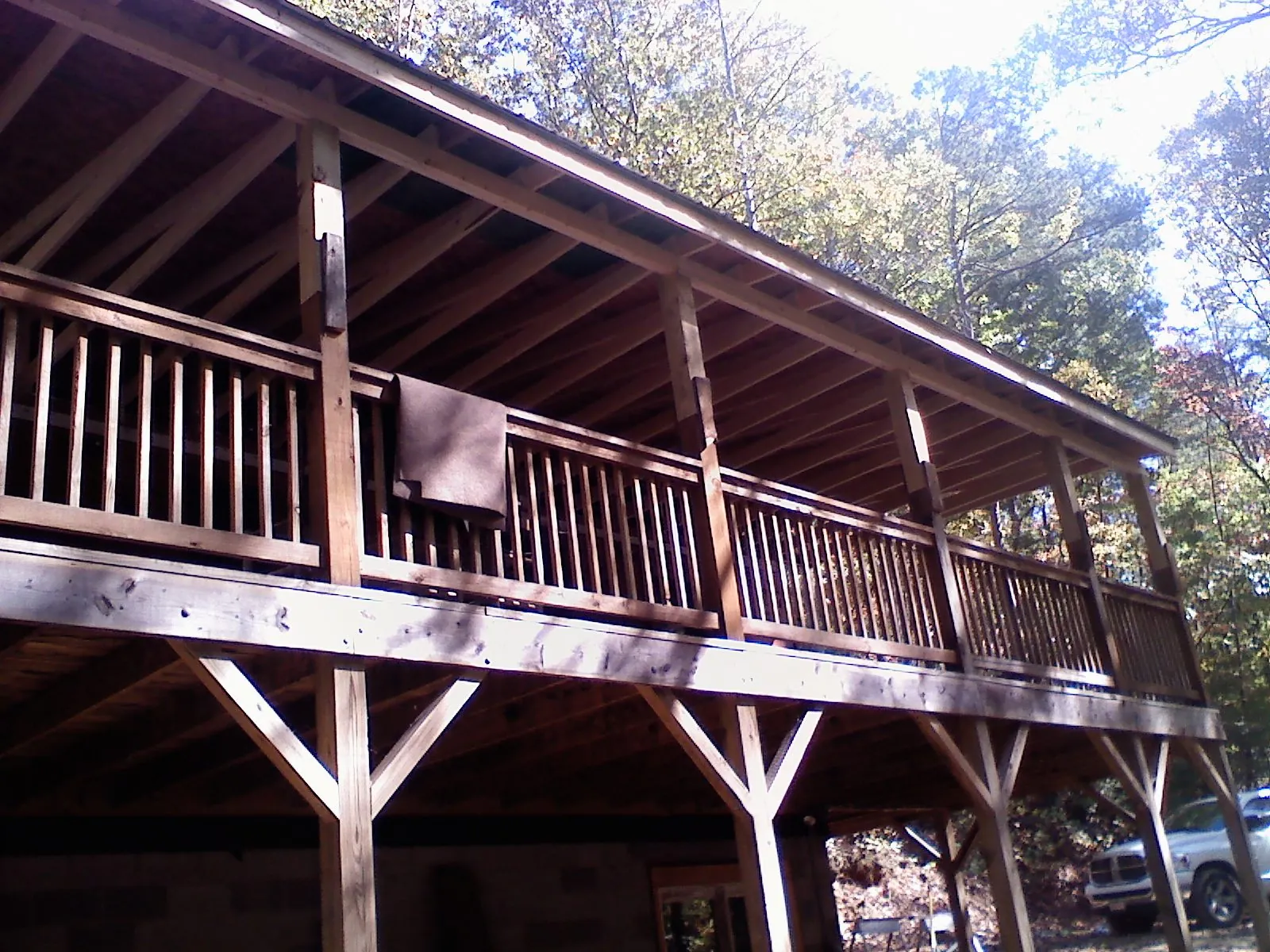 Timber framing under a new elevated porch and deck — Roof Leak Repair in Elk Creek by Roofing Brothers